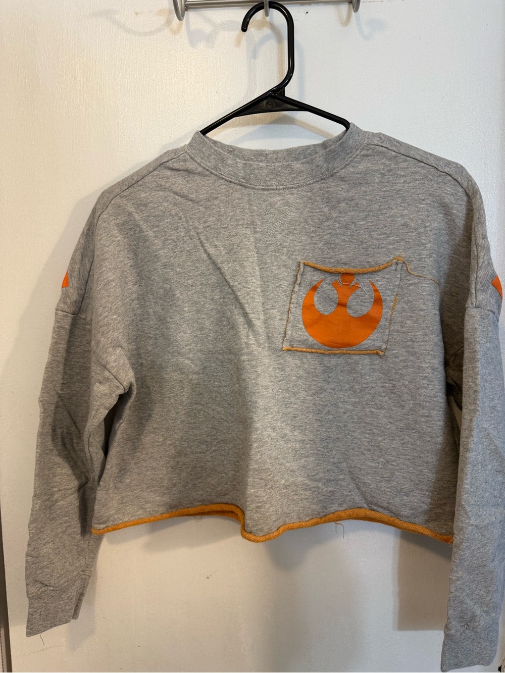 Her Universe Grey and Orange Cropped Sweatshirt with Rebel Emblem